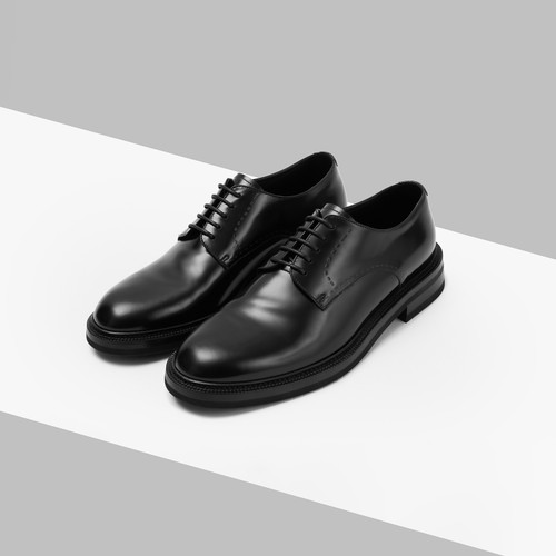 Black derbies, stitching details Black derbies, stitching details