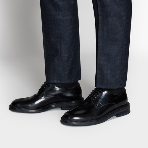 Black derbies, stitching details