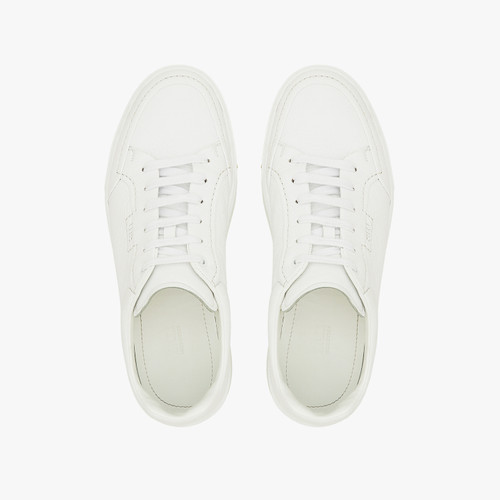 White sneakers with stitching, beige and white sole White sneakers with stitching, beige and white sole