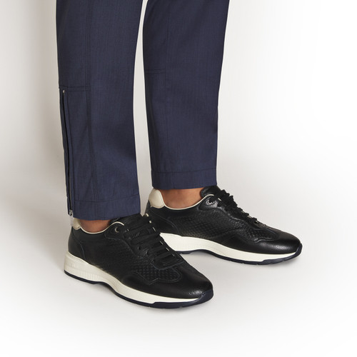 Black perforated sneakers, dark navy and white sole