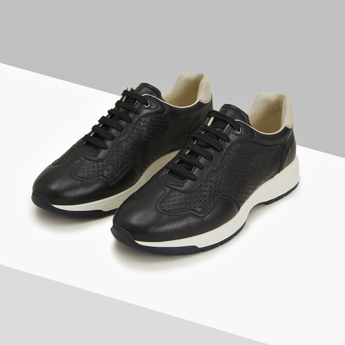 Black perforated sneakers, dark navy and white sole