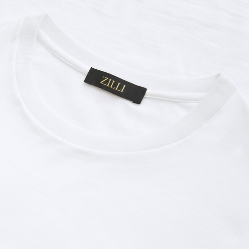 T-shirt blanc, col rond, poche avant, broderie "Maison ZILLI EST 1965" T-shirt blanc, col rond, poche avant, broderie "Maison ZILLI EST 1965"