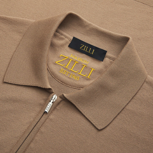 Polo zippé camel, bandes latérales en cuir