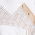 Natural white “Braid Vanisé” button-down polo shirt