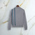 Grey “Vertical Stripes Trama” zipped polo shirt