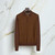 Clay ”Micro Herringbone Stitch Gold” zipped polo shirt