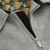 Dusty Ivory “Triangles Embroidery” blouson jacket
