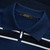 Navy blue zipped polo, "Block stripes"