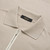 Pale fawn zipped polo, ribbon stiching