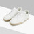 White sneakers with stitching, beige and white sole