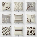 collection of throw pillows in beige, gray and brown