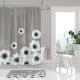 beige shower curtain with large white flowers