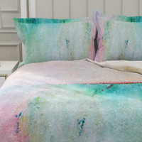 comforter cover in teal and pink with abstract design