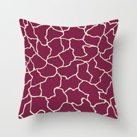 burgundy pillow cover with geometric pattern