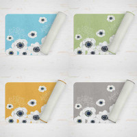 bath mats with large flowers in blue, yellow, green and beige