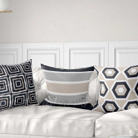 sofa pillows with stripes and geometric design in beige and gray