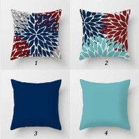 outdoor pillow covers with floral design in blue, teal and red