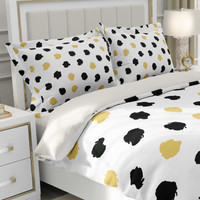 bedding set, duvet cover and shams with black and yellow dot pattern