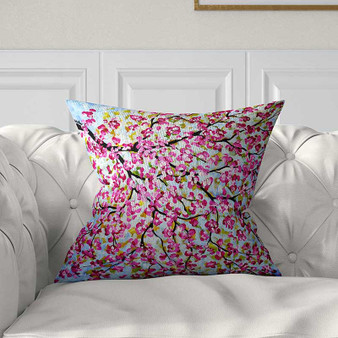 decorative pillow with cherry tree in pink and blue