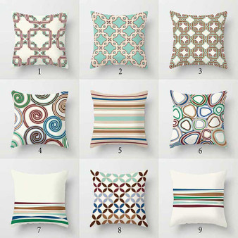 designer throw pillows in red, blue and brown with original patterns