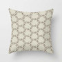 beige decorative pillow with trellis pattern