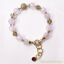 rose quartz bracelet with golden elements