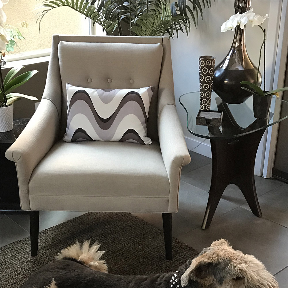 brown and gray decorative cushions with stripes