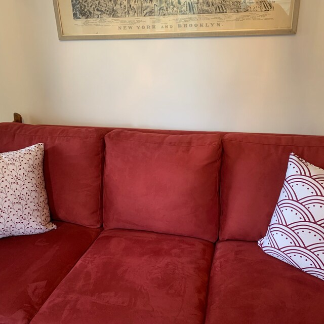 burgundy throw pillows with geometric patterns