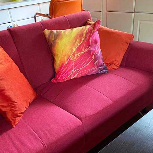 abstract art pillow in red, orange and purple