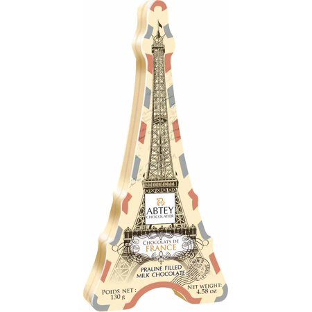 A 130 gram tin shaped like the Eiffel Tower, filled with milk chocolate pralinés made by Abtey.