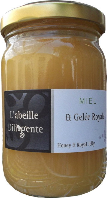 A 250 gram glass jar of honey with royal jelly from L'Abeille Diligente.
