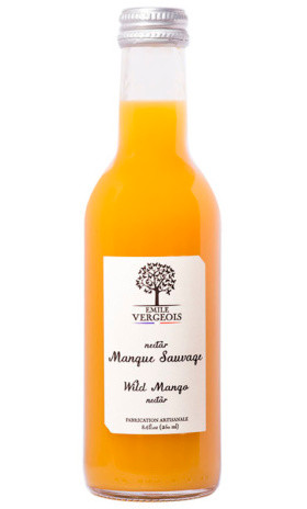 A 25 centiliter bottle of mango nectar juice, made by Émile Vergeois. The label has an illustration of an oak tree.