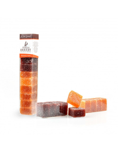 A 180 gram plastic tube of apricot and morello cherry pâtes de fruits, or fruit jellies, from François Doucet. The jellies are shaped into firm squares of gold and red.