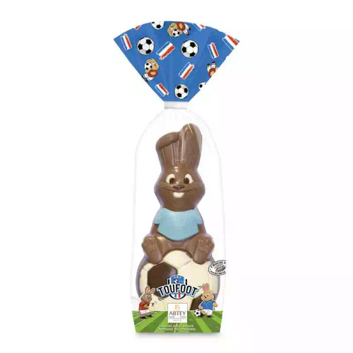 A 170 gram milk chocolate Easter bunny sitting on a soccer ball from the French company Abtey.