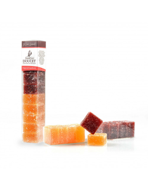 A 180 gram plastic tube of pear and raspberry pâtes de fruits, or fruit jellies, from François Doucet. The jellies are shaped into firm squares of gold and red.