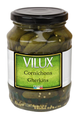 A 190 gram jar of cornichons, or tiny gherkins, in vinegar. Made by Vilux.