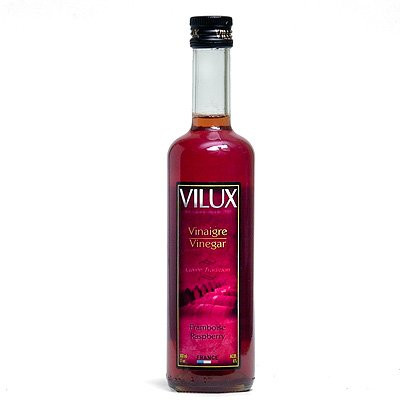 A 50 centiliter bottle of Vilux raspberry vinegar.