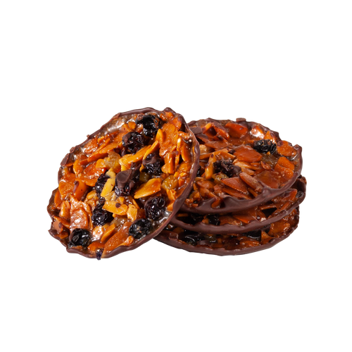 A stack of dark chocolate and orange covered Florentine cookies from Maison de Florentins. One is tipped to show a sugar-glazed surface of candied oranges, nuts, and raisins.