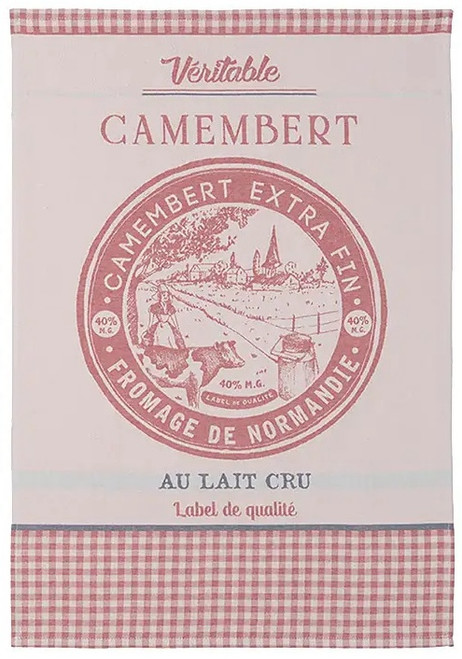 A "Camembert" style tea towel from Coucke. The towel has a cream background with faded red stripes at the border. In the center is a seal that would typically go on a cheese wheel: it depicts a farmer next to a cow and says, "Camembert extra fin: fromage de Normandie."