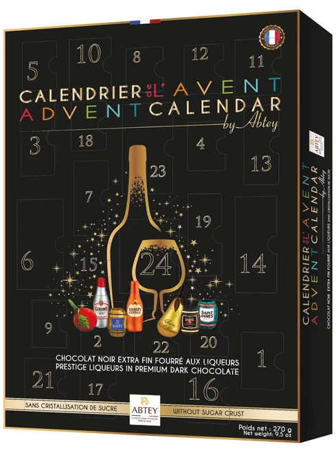 A270 gram Abtey "select" Advent calendar containing 24 liqueur-filled dark chocolates. The front of the calendar is black with sleek golden accents, centered around a golden outline of a liqueur bottle.