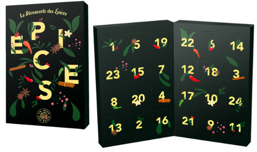 A pair of Advent calendars from Comptoir & Co containing 24 varieties of spices in sachets. A closed calendar that says, "Spices¨ in jumbled letters sits next to an open calendar whose inside is lettered 1 through 24.