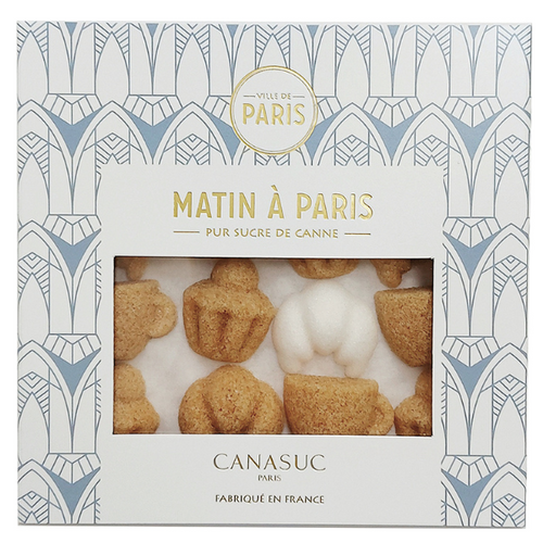 A 90 gram box of "matin à Paris" sugar pieces from Canasuc. The brown and white sugar pieces are shaped like croissants, coffee cups, and brioche.