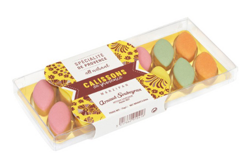 A 75 gram container of mini Tutti Frutti calissons from Arnaud Soubeyran. The calissons are topped with bold orange, green, pink and yellow icing.