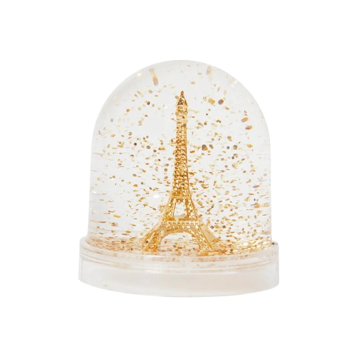A snow globe from Les Parisettes containing a miniaturized golden Eiffel Tower.
