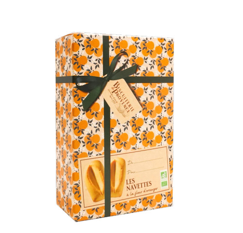 Biscuiterie de Provence's organic orange blossom navettes in a 100 gram gift box. The box is printed with a sepia-tinged illustration of oranges and an image of a black ribbon.