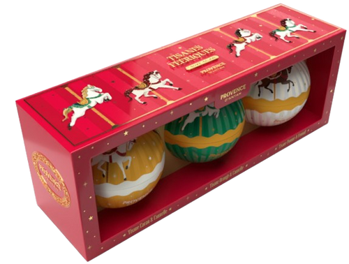 A red, open-faced box containing a set of 3 carousel themed ornaments, each filled with organic herbal tea from Provence d'Antan. Each ornament features an illustration of several carousel horses wrapping around center.