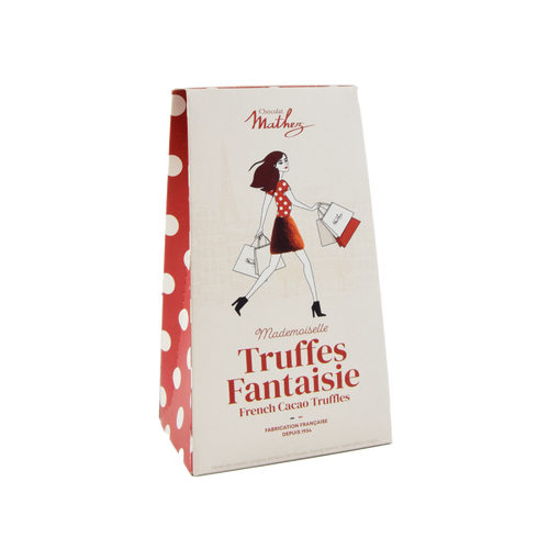A tan and red box with an illustration of a lady with a shopping bag, containing 100 grams of cocoa-powdered truffles from Mathez.
