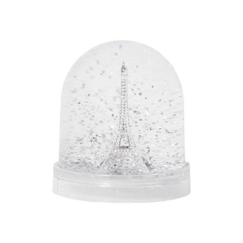 An snow globe containing a silver model of the Eiffel Tower from Les Parisettes.