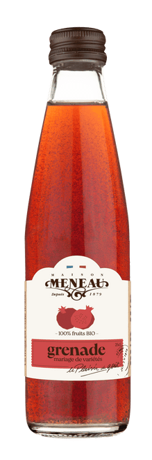A 25 centiliter glass bottle of Meneau's organic pomegranate juice.