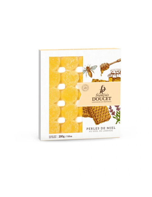 A 200 gram box of François Doucet lavender honey pearls yellow pearls.
